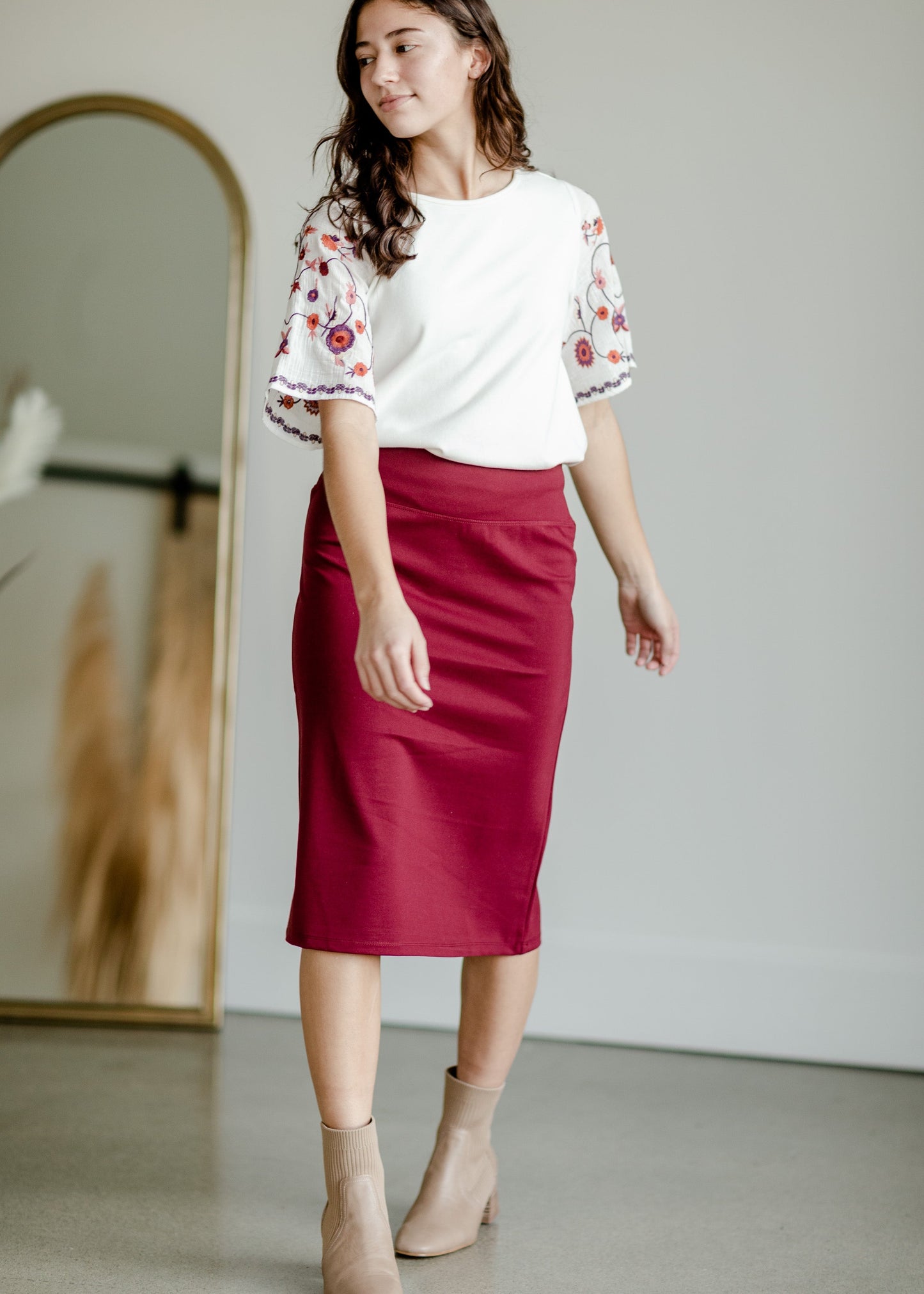 This is the quinn knit midi skirt that is made of high quality knit with a stretch waistband and is in a streight fit.