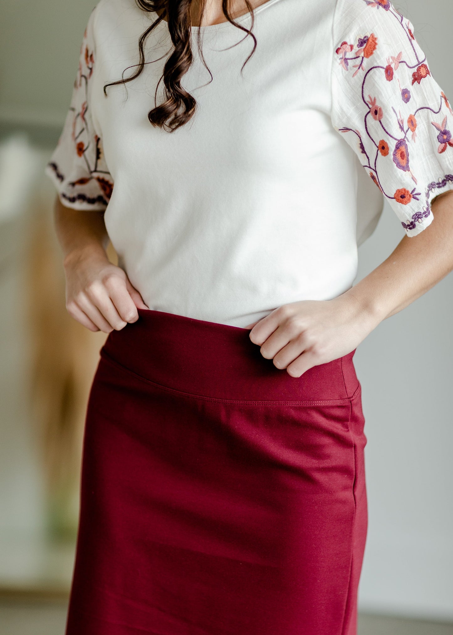 This is the quinn knit midi skirt that is made of high quality knit with a stretch waistband and is in a streight fit.