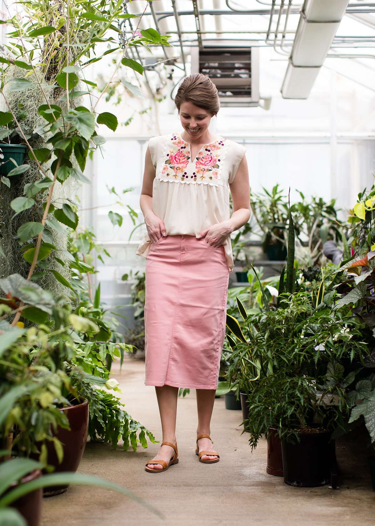 Pink colored denim below the knee skirt