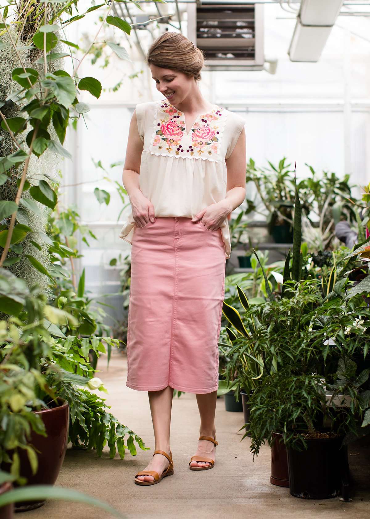 Pink colored denim below the knee skirt