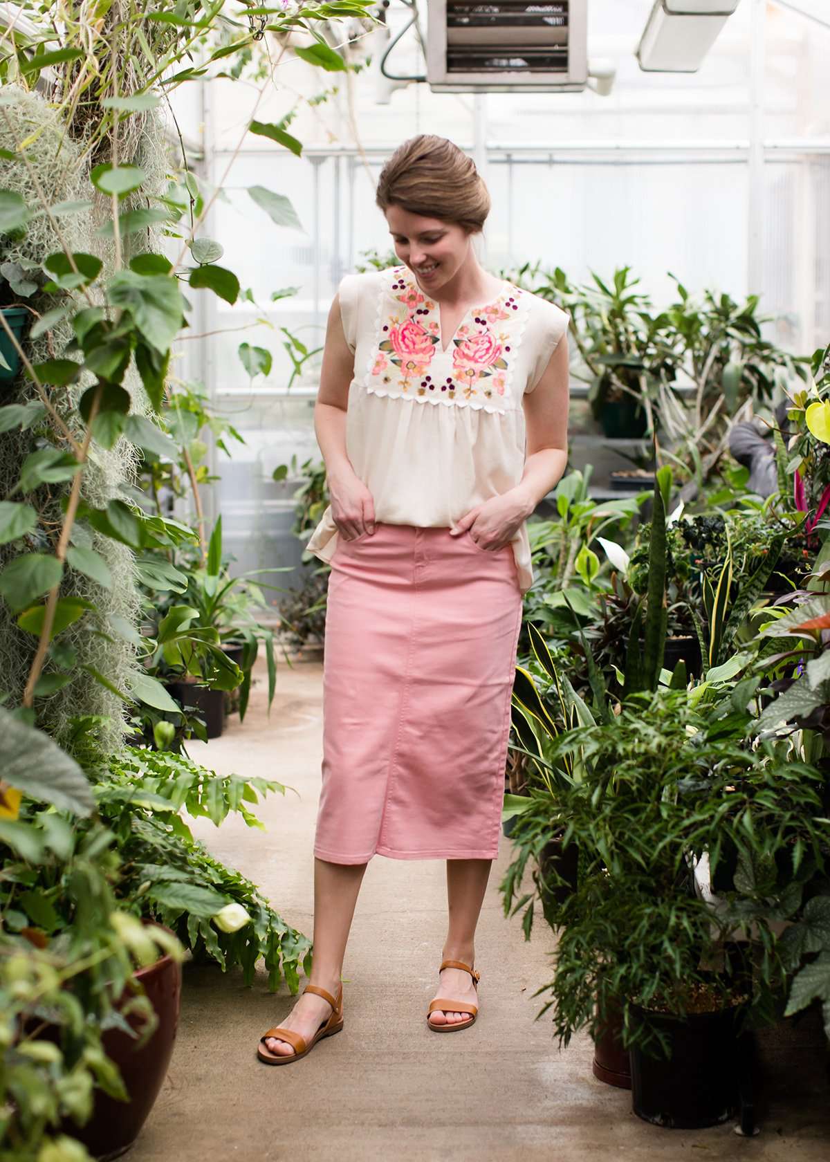 Pink colored denim below the knee skirt