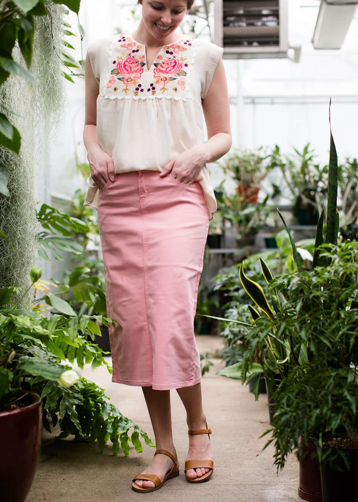 Pink colored denim below the knee skirt