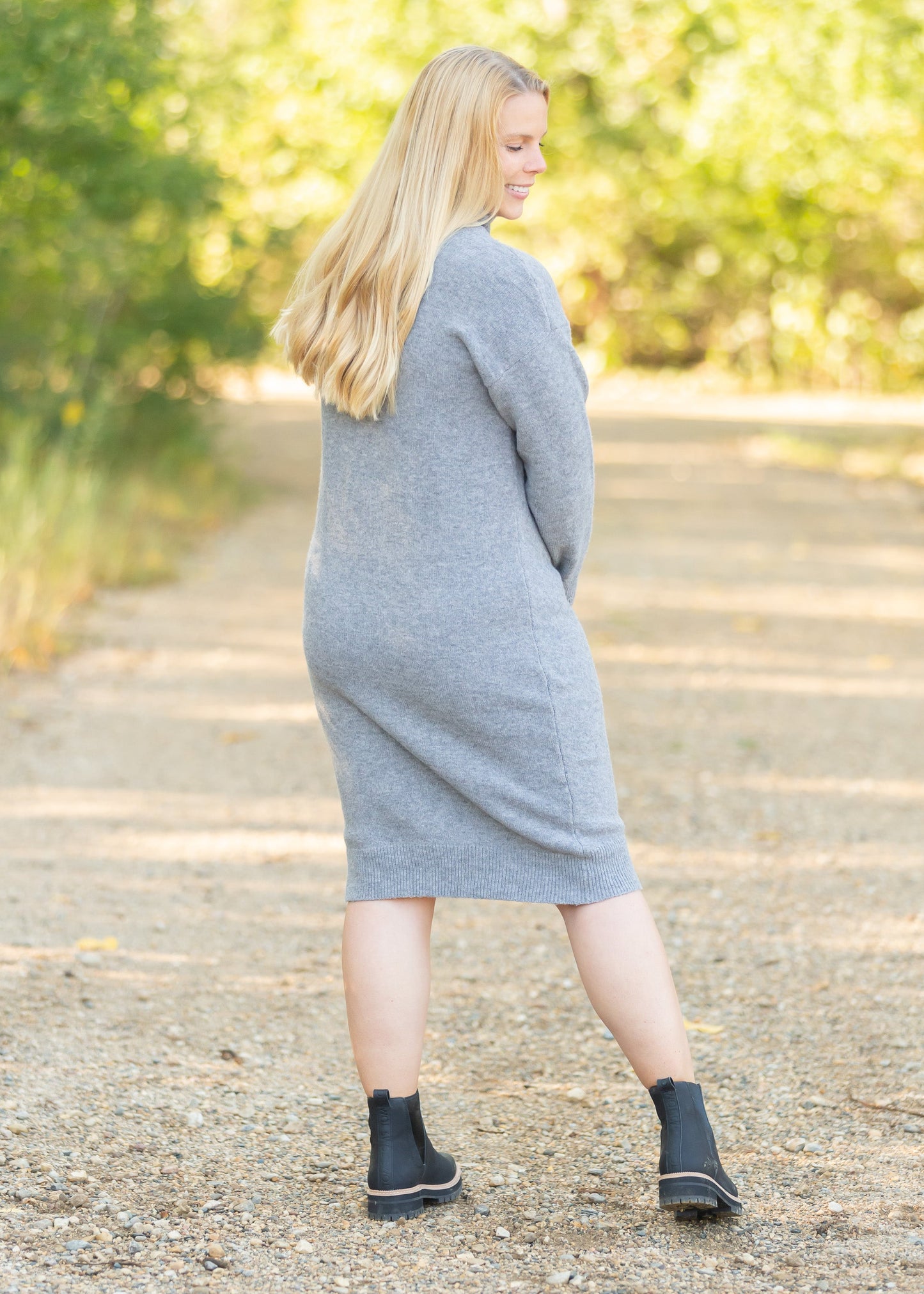 The Samantha Cowl Neck Sweater Dress is an Inherit Design that has a beautiful marled heathered look you'll love! Made from high quality fabric, you'll be able to wear this season after season. This dress is tailored with straight, clean lines for a flattering fit and we love the coziness of the cowl neck!