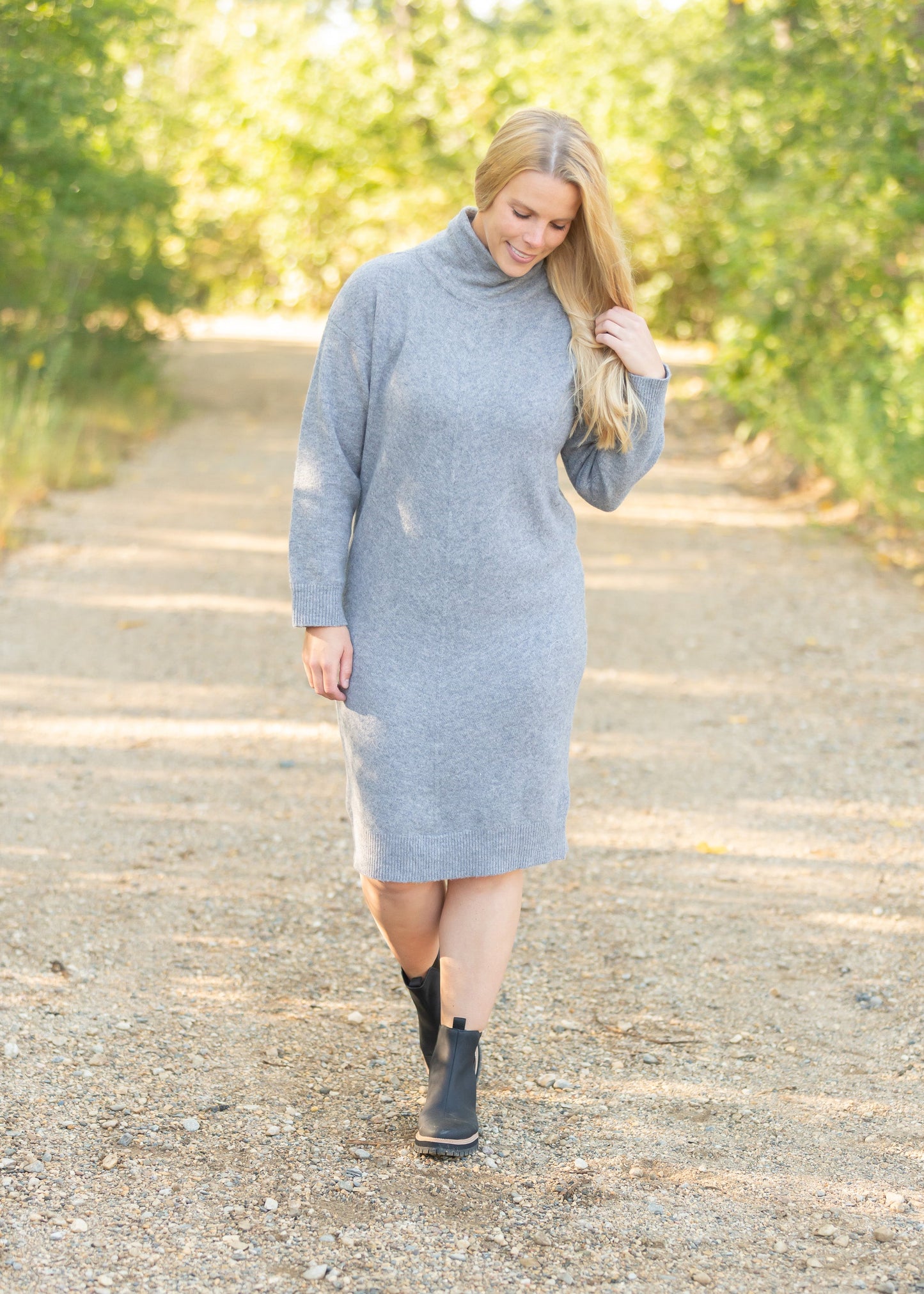 The Samantha Cowl Neck Sweater Dress is an Inherit Design that has a beautiful marled heathered look you'll love! Made from high quality fabric, you'll be able to wear this season after season. This dress is tailored with straight, clean lines for a flattering fit and we love the coziness of the cowl neck!