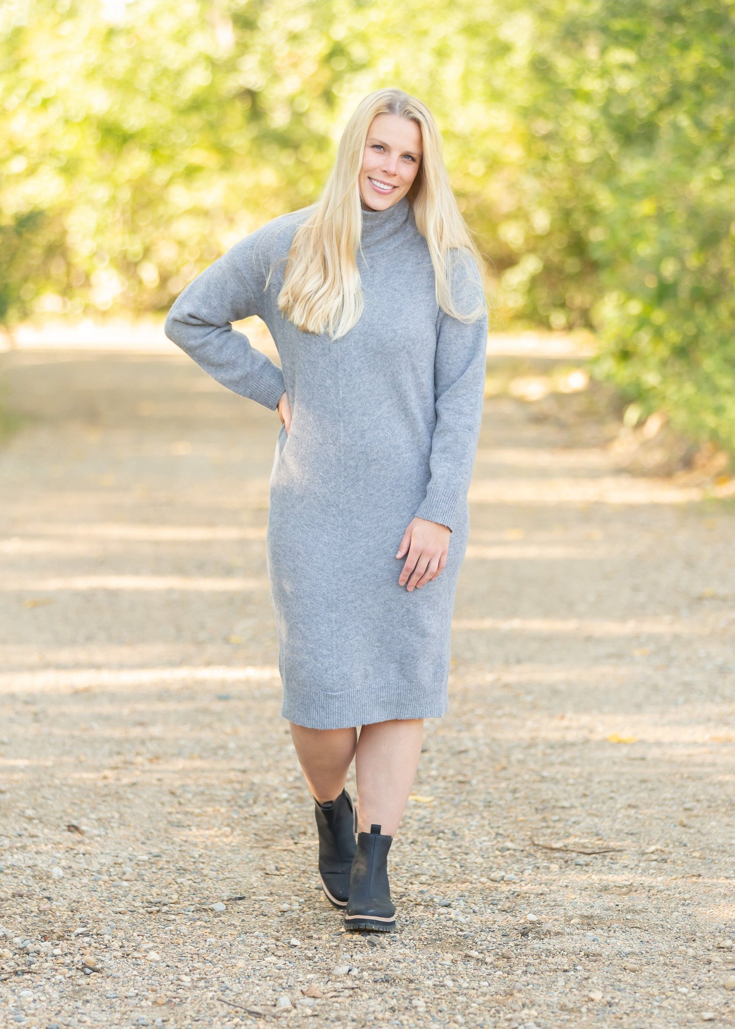 The Samantha Cowl Neck Sweater Dress is an Inherit Design that has a beautiful marled heathered look you'll love! Made from high quality fabric, you'll be able to wear this season after season. This dress is tailored with straight, clean lines for a flattering fit and we love the coziness of the cowl neck!