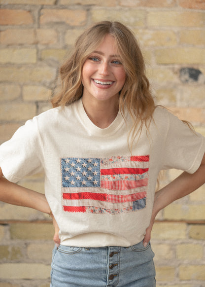 Casual patriotic graphic tee with vintage-inspired American flag artwork
