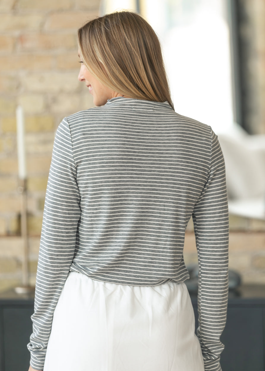 Back of the gray and white striped knit top with a comfortable everyday fit.