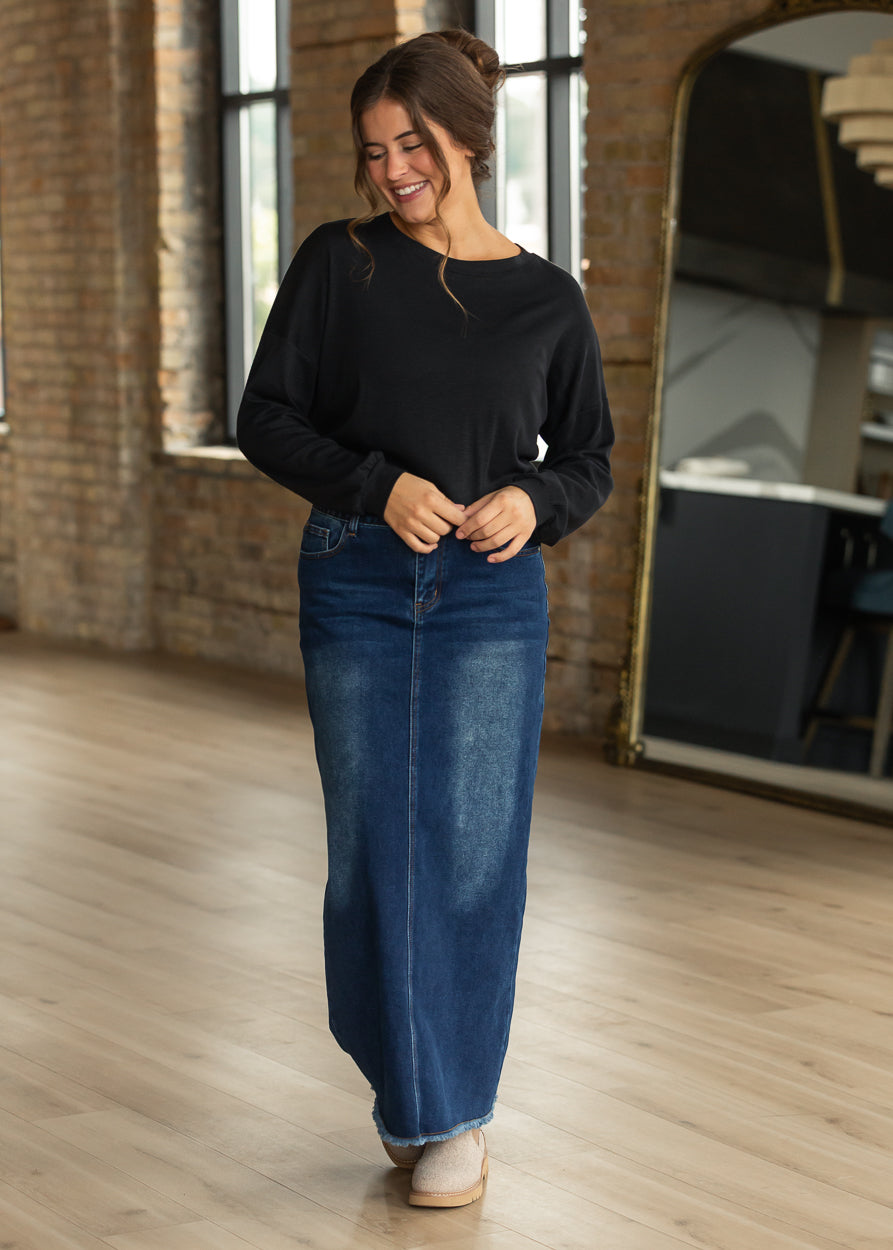 Black cotton modal slub top styled with a dark wash denim maxi skirt.