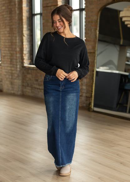 Black cotton modal slub top styled with a dark wash denim maxi skirt.