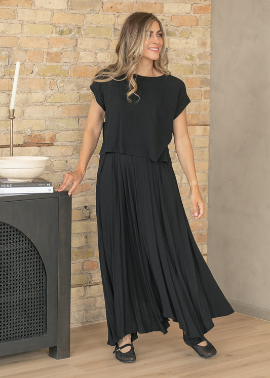 Black gauze maxi skirt and cropped top set with flowing silhouette