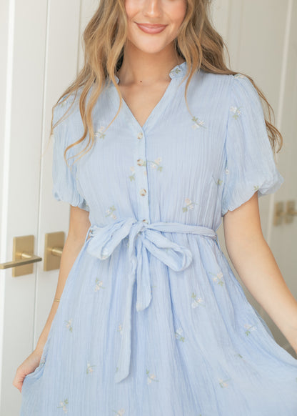 Blue floral embroidered dress with functional buttons and side pockets