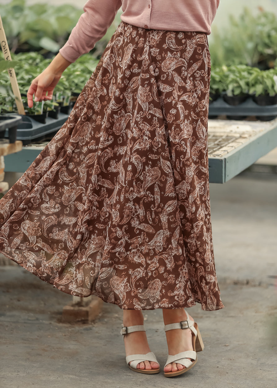 Brown paisley skirt paired with a mauve lightweight cardigan