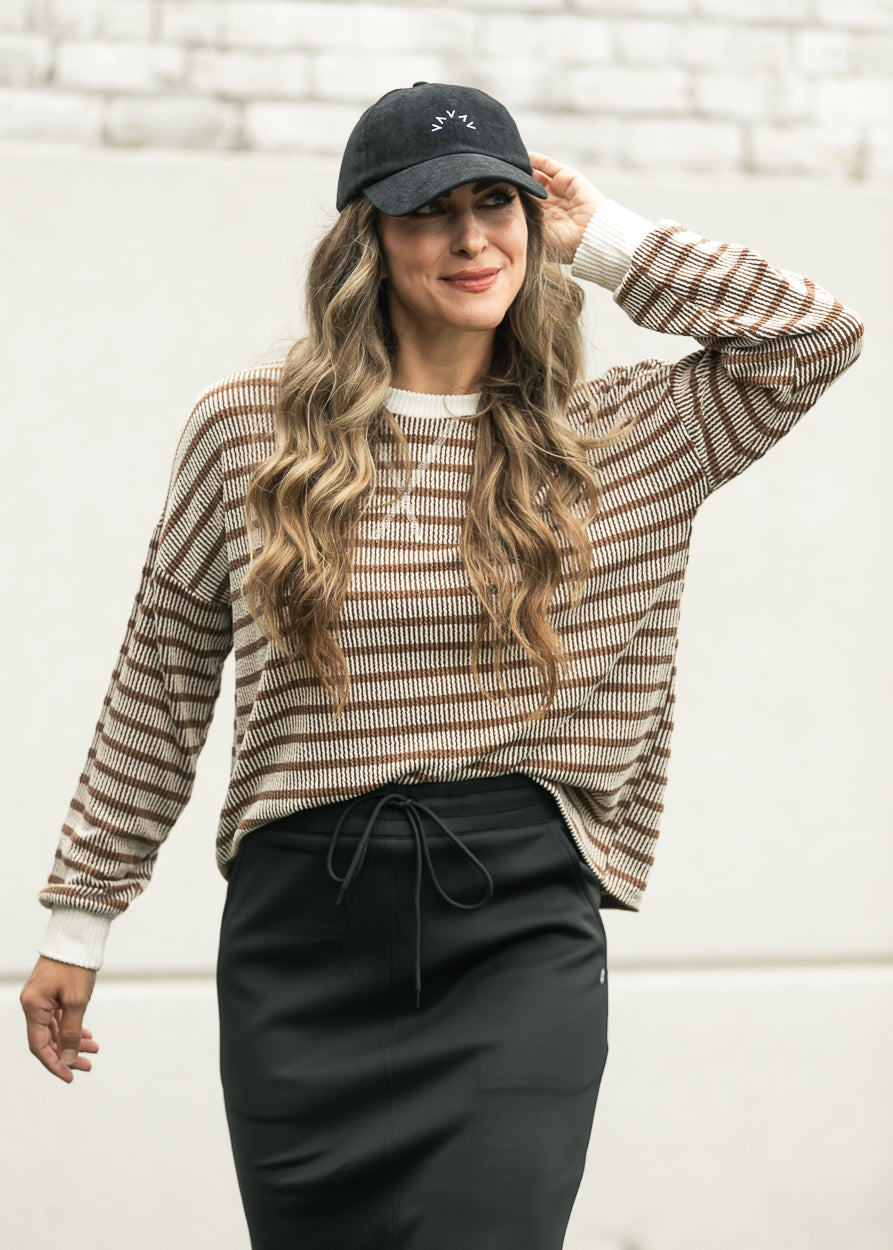 Brown and cream ribbed round neck pullover top with contrast neckline and cuffs.