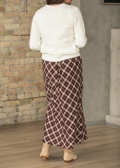 Back of burgundy plaid A-line midi skirt showing flowing silhouette and 36-38 inch length.