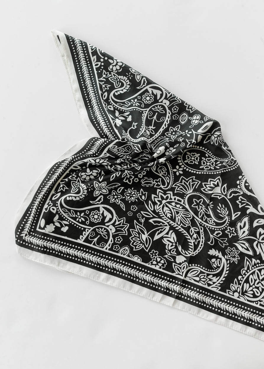 Folded Classic Black Paisley Satin Scarf displaying the black and white paisley print and satin finish.