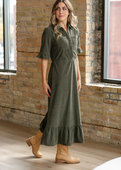 Olive corduroy midi dress with collared neckline, front buttons, chest pockets, and ruffle-trim sleeves.