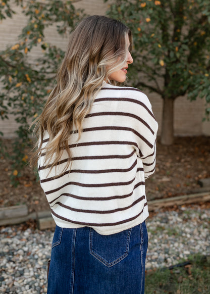 Back of the striped Piper cardigan showing its relaxed, drop-shoulder fit and ribbed hem.