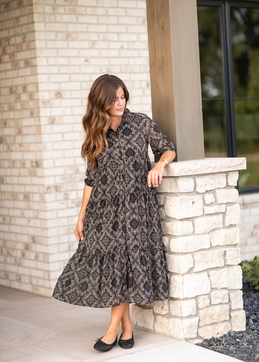 Full-length Elsie paisley midi dress with half sleeves and tiered A-line skirt.