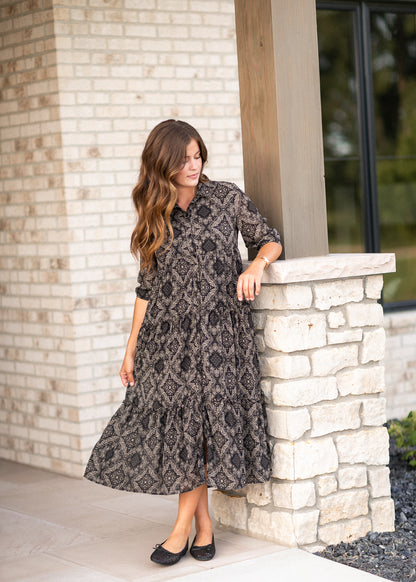 Full-length Elsie paisley midi dress with half sleeves and tiered A-line skirt.