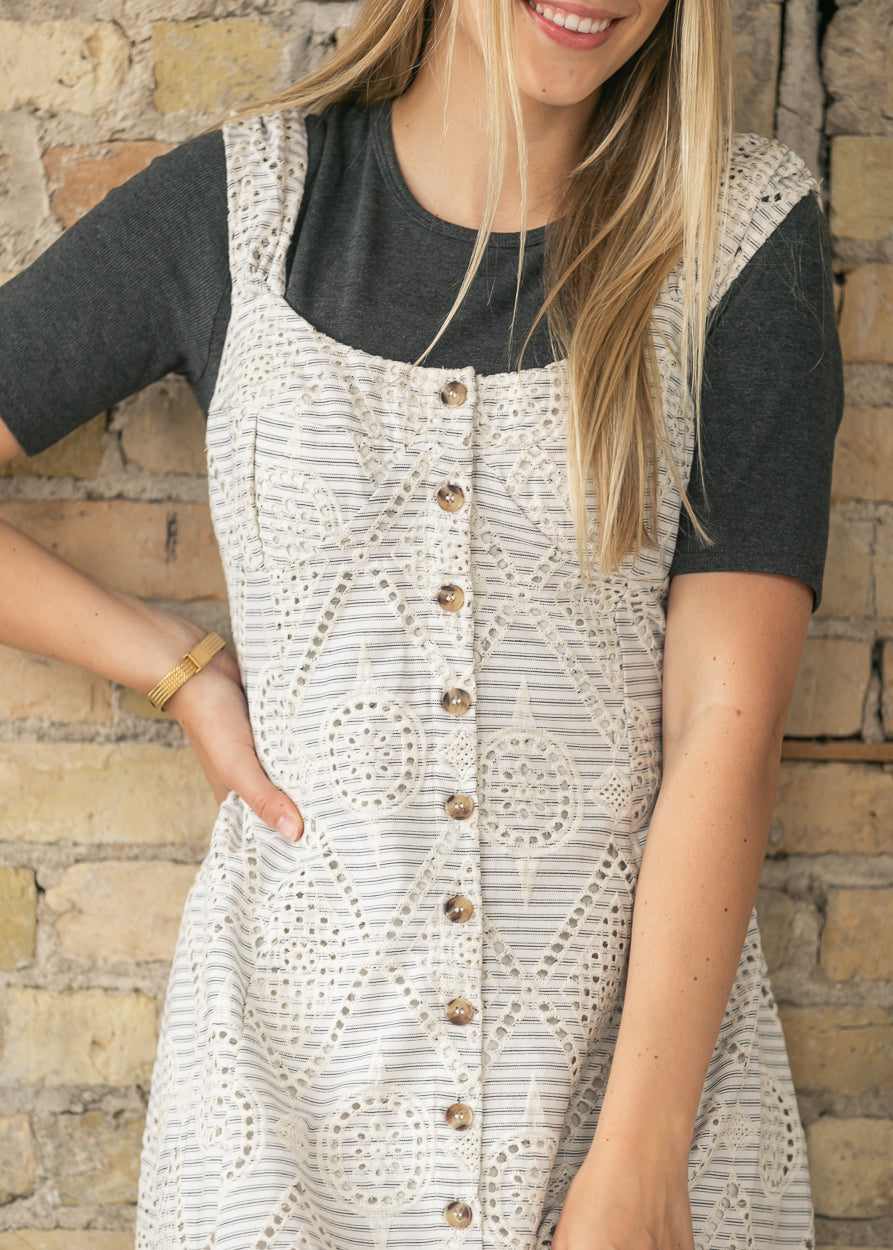 Back view of cream embroidered eyelet maxi dress