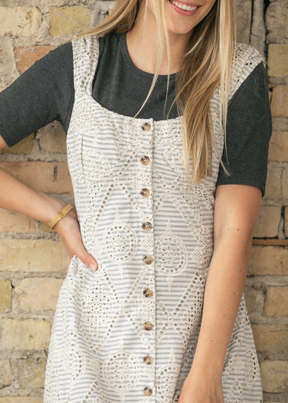 Back view of cream embroidered eyelet maxi dress