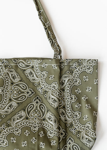 Olive floral printed canvas tote bag with cream paisley pattern, open top, and matching shoulder straps.