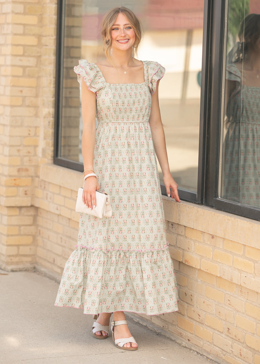 Flowing floral maxi dress with tiered hem detail