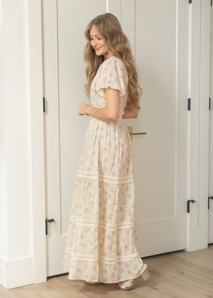 Women's floral occasion dress with tiered maxi silhouette