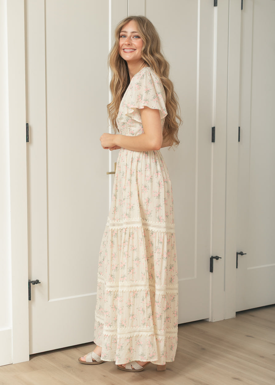 Women's floral occasion dress with tiered maxi silhouette