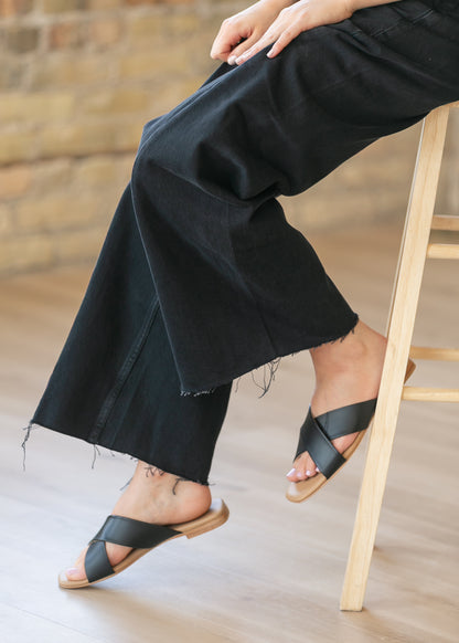 Catalina black slide sandal styled with wide leg black jeans