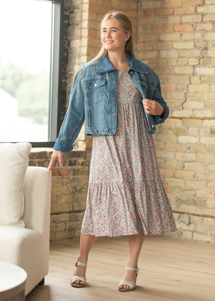 River Wash denim jacket layered over a floral midi dress for everyday styling