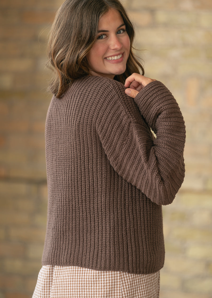 Back of the espresso button front sweater cardigan with a relaxed fit and ribbed knit detail.