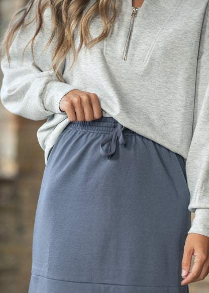 Close up of the Gracie Dusty Blue Midi Sweatshirt Skirt elastic waistband and adjustable drawstring tie