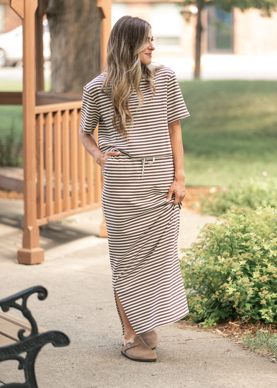Chocolate stripe maxi skirt styled outdoors with matching boxy tee and neutral clogs.
