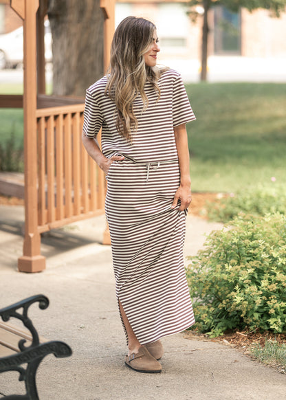 Chocolate stripe maxi skirt styled outdoors with matching boxy tee and neutral clogs.
