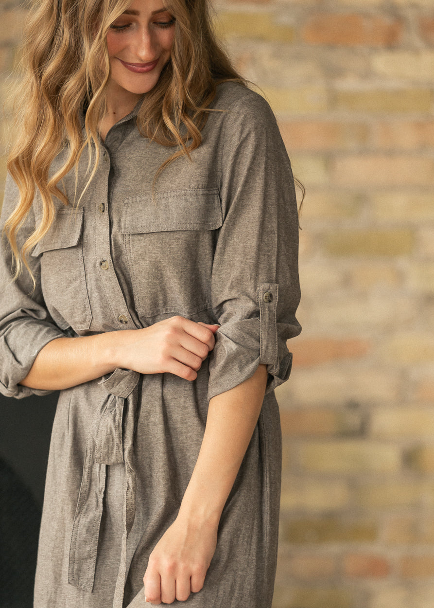 Brown chambray midi dress layered with a coffee cardigan for a warm neutral outfit.