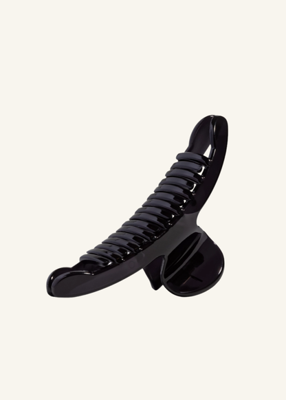 Kitsch™ black large arched hair clip with a glossy finish, curved shape, and interlocking claw teeth.