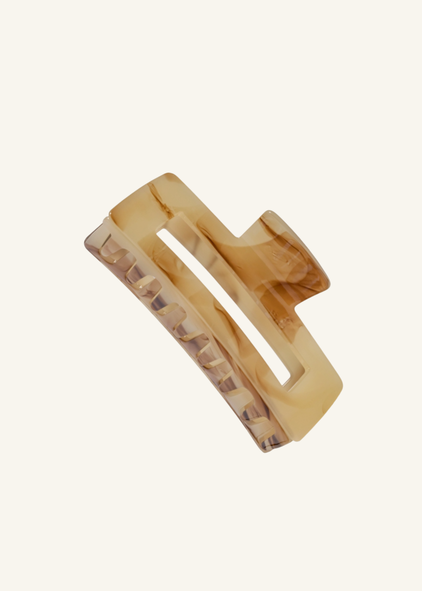 Kitsch™ jumbo open shape claw clip in warm translucent tan with tortoise-inspired variation and wide teeth.