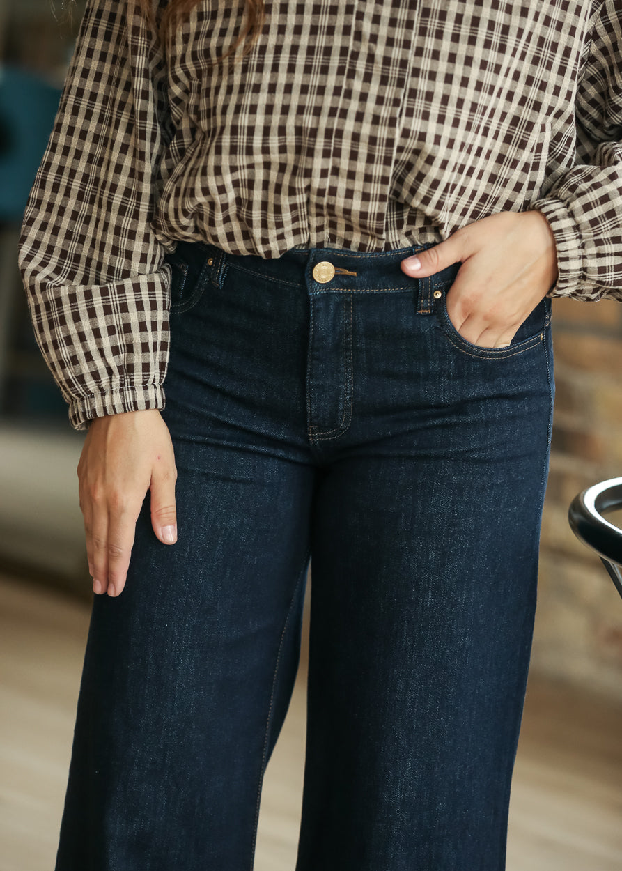 Close view of dark wash Maya jeans with high-rise waist and front pocket