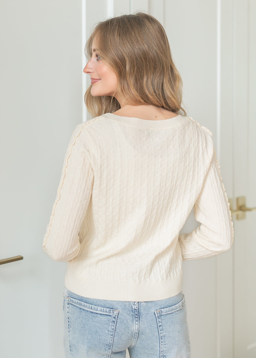 Cream long sleeve cardigan with textured knit detail