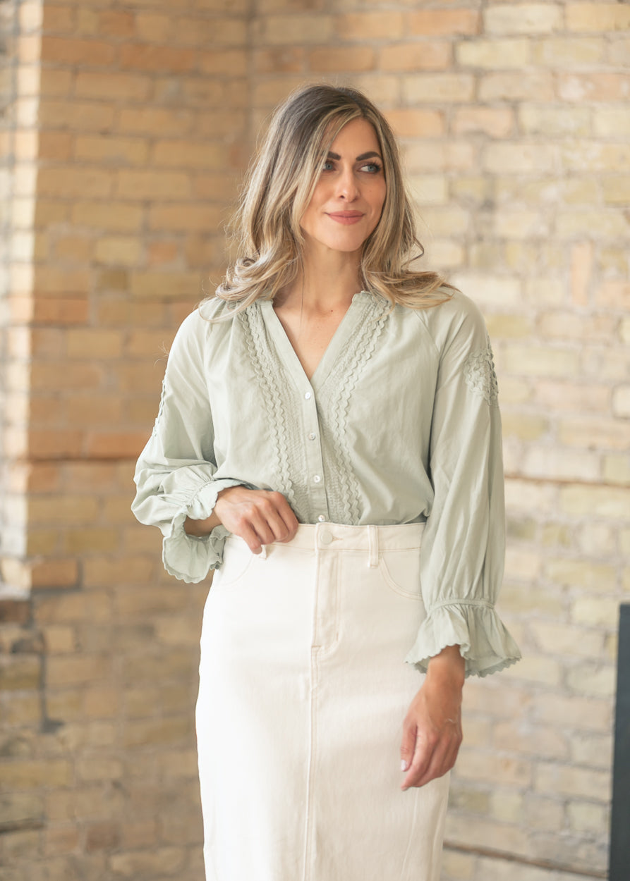 Women's woven blouse in soft sage green
