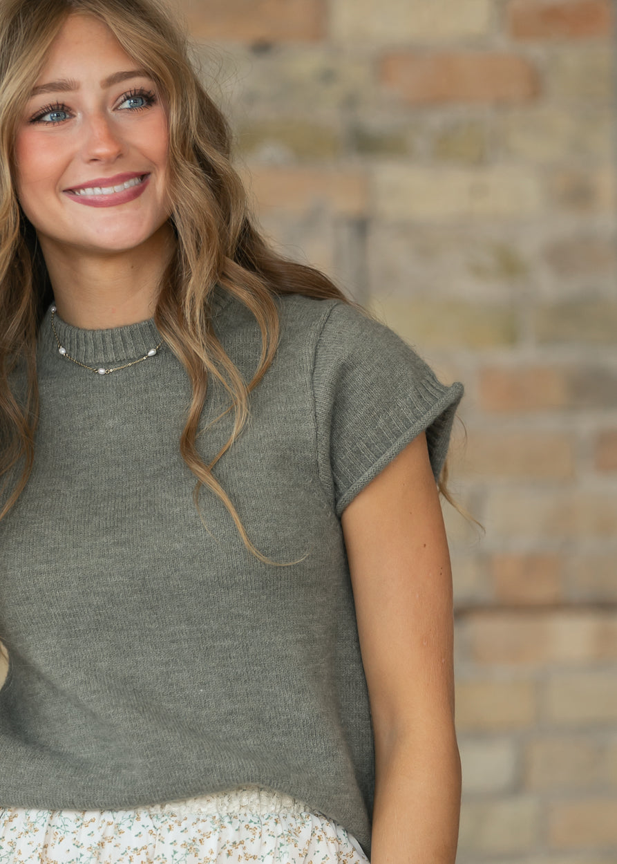 Light olive short sleeve sweater T-shirt with a relaxed silhouette and ribbed neckline.