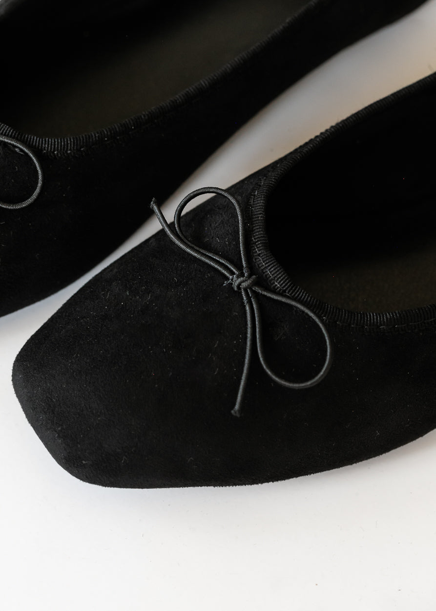 Close-up of black MIA Tinna ballet flat with velvety-soft finish and delicate bow detail.