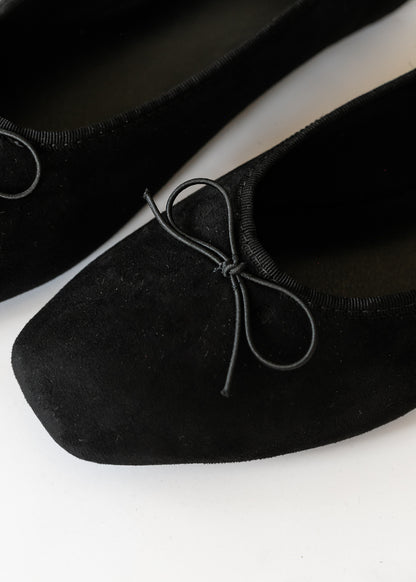 Close-up of black MIA Tinna ballet flat with velvety-soft finish and delicate bow detail.