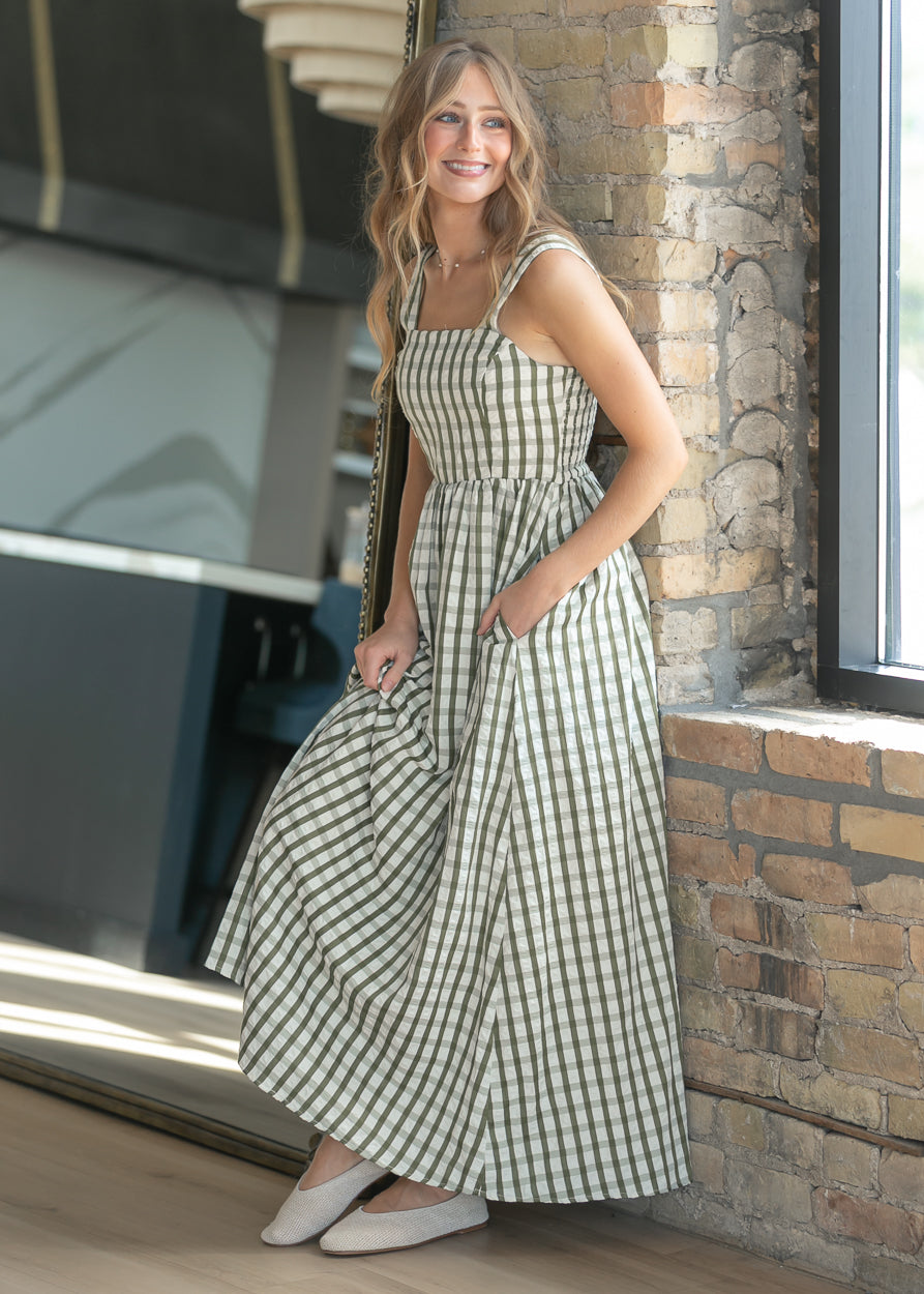 Sweet pea green gingham maxi dress with square neckline and sleeveless bodice.