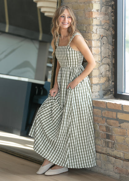 Sweet pea green gingham maxi dress with square neckline and sleeveless bodice.