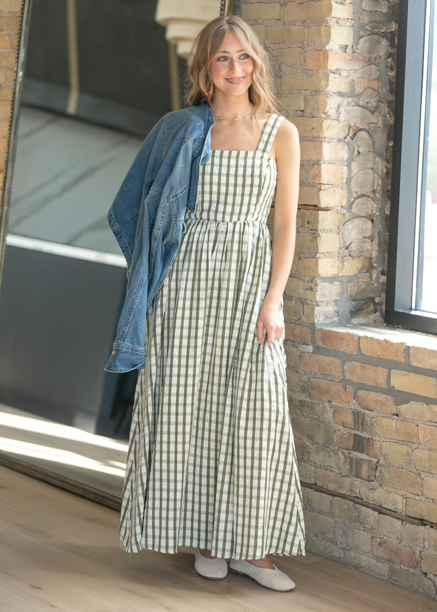 Sweet pea gingham maxi dress layered with an oversized denim jacket.