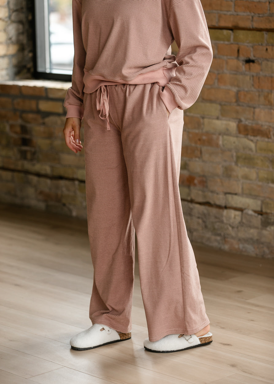Mauve olive striped wide-leg pants with side pockets, elastic waist, and functional drawstring.
