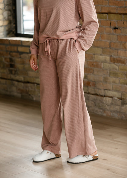 Mauve olive striped wide-leg pants with side pockets, elastic waist, and functional drawstring.