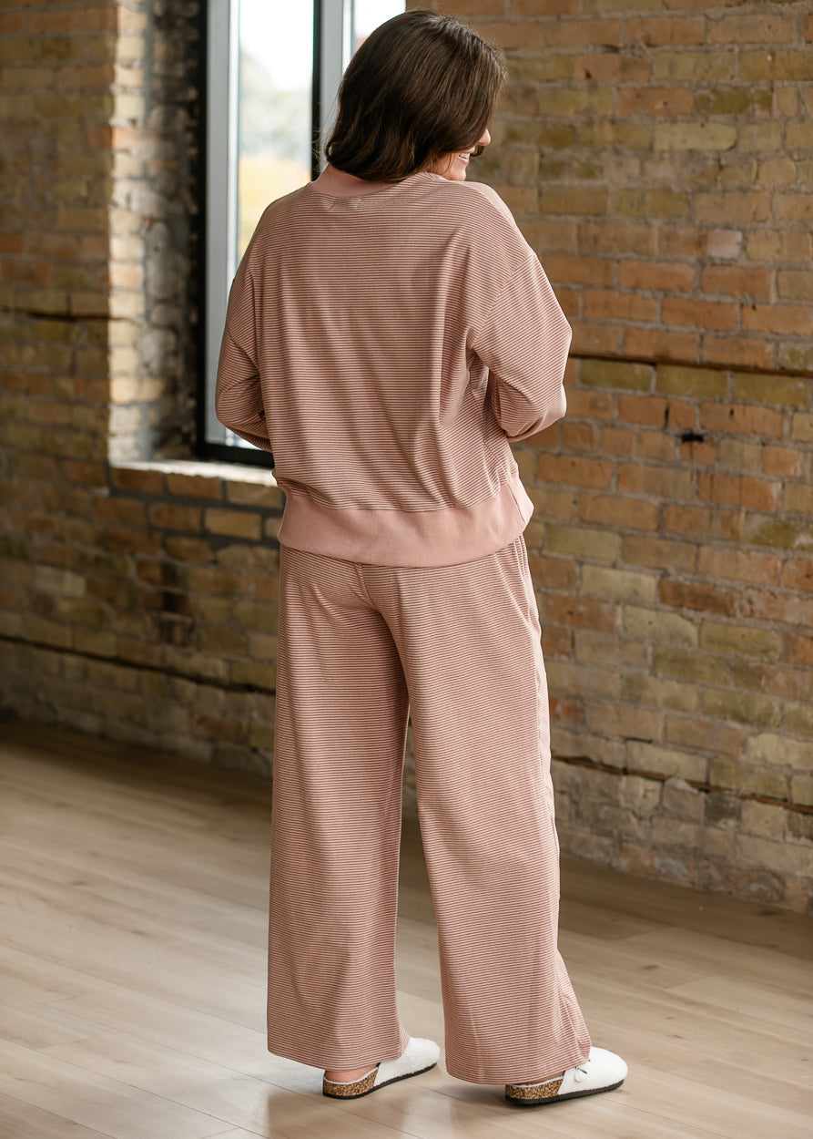 Mauve olive striped drawstring pants styled with the coordinating mock neck top and white clogs.